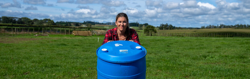 Leah pushing over a barrel of bloat oil because she is bored of bloat oil